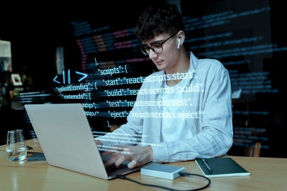 a person holding a smartphone displaying a Text to Speech app with a digital brain graphic